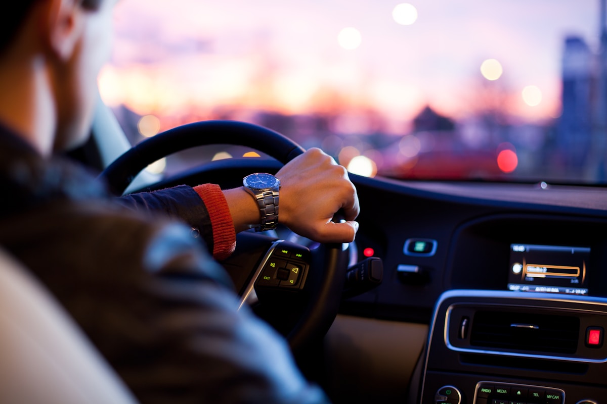 Professional driver with a clean modern vehicle ready for daily travel